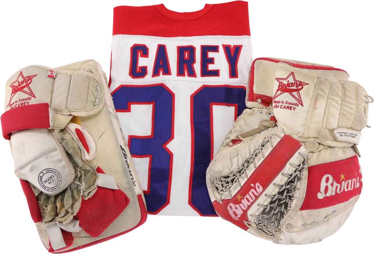 - Circa 1994-95 Jim Carey Washington Capitals Game Worn Jersey, Catcher, and Blocker